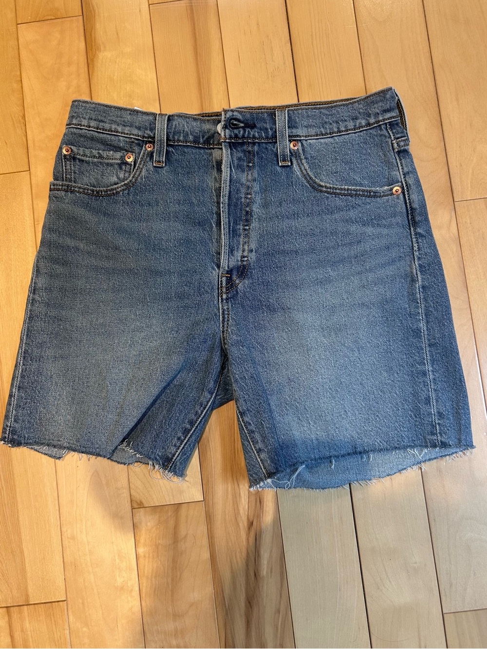 Levi’s Mid-Thigh Cut Off Jean Shorts